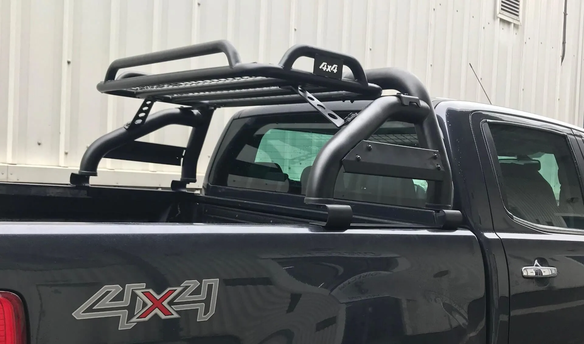 Black Short Arm Roll Sports Bar with Cargo Basket Rack for the Ford Ranger